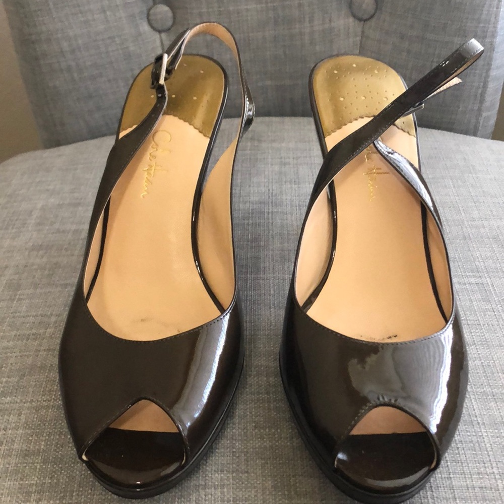 Brown Cole Haan open-toed sling back heels.